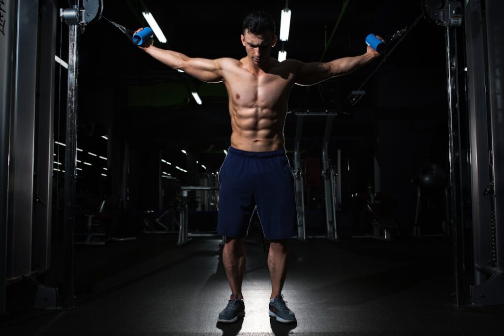 Adult man strength training in a gym