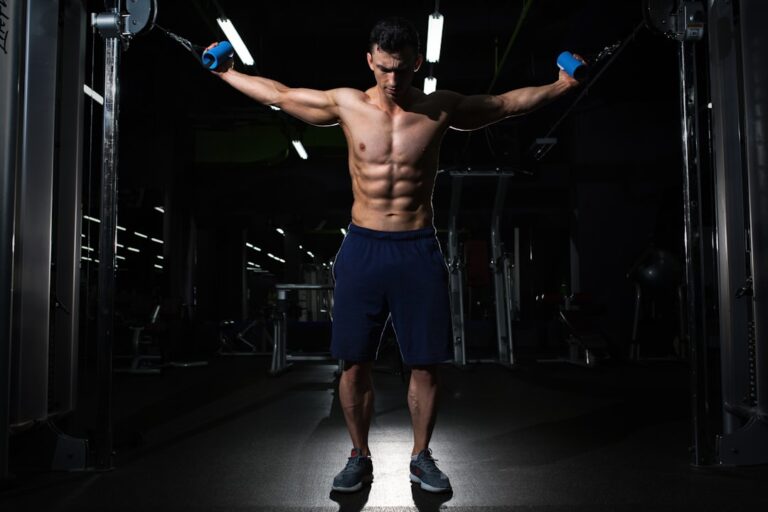 Adult man strength training in a gym