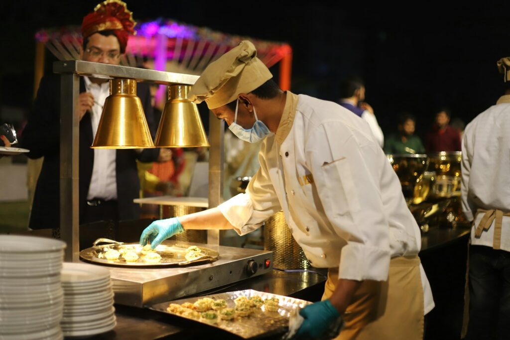 Chef preparing food for a production catering service