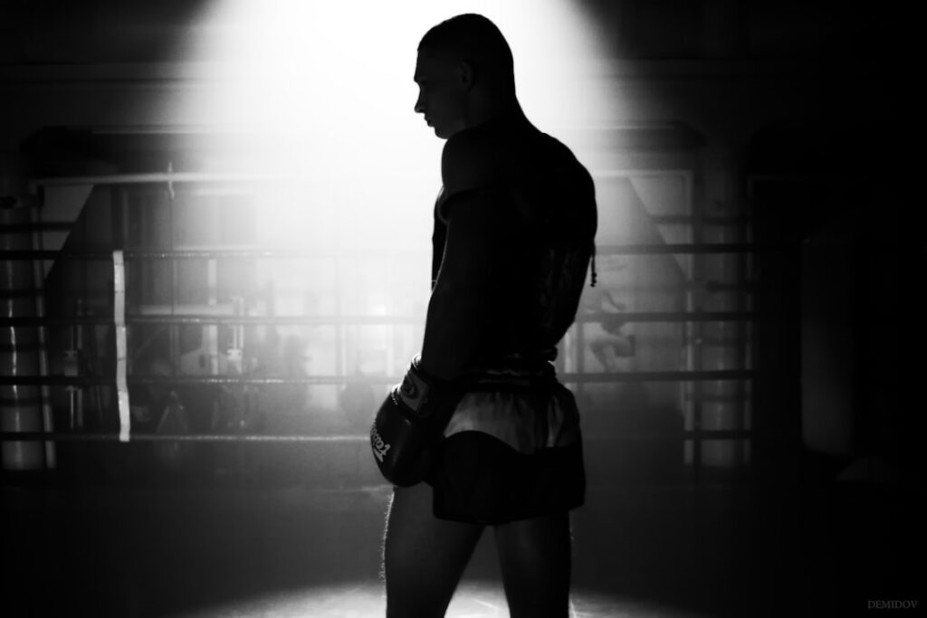 Boxer training in a gym during physical role preparation